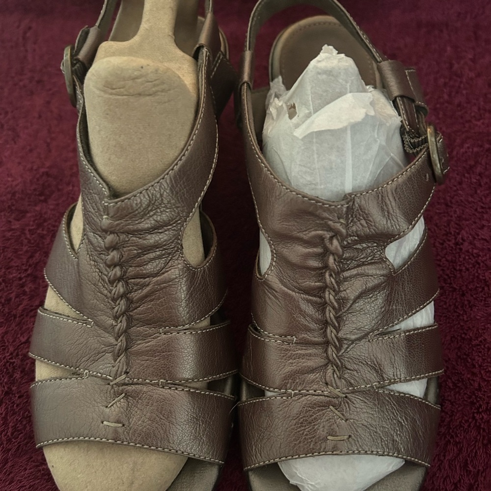 Clark sandals pewter color.